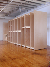 Art Storage System for the storage of fine art in an the art gallery has extra deep art storage shelves and drawers.