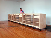 Art Boards™ Art Studio Desk is195” long and 36” high, with adjustable shelves and drawers by Art Boards™.