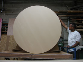 Circular wood custom size art panel is 1.5" thick by 60" wide.