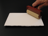 Apply light preasure to mount the canvas, paper or finished art.