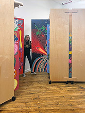 The photo shows Art Boards™ Art Storage System connected front to back. Which increases the overall storage depth for large paintings of any length.